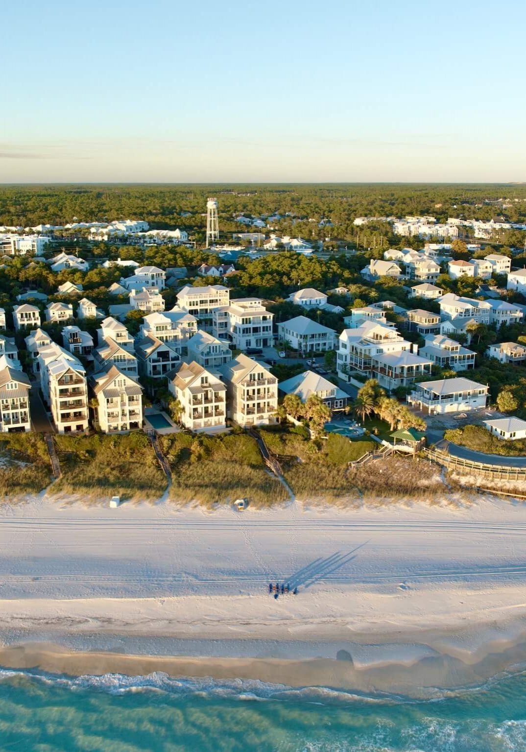 Aerial view of coastal homes and beachfront in Inlet Beach, Florida along Scenic Highway 30A
