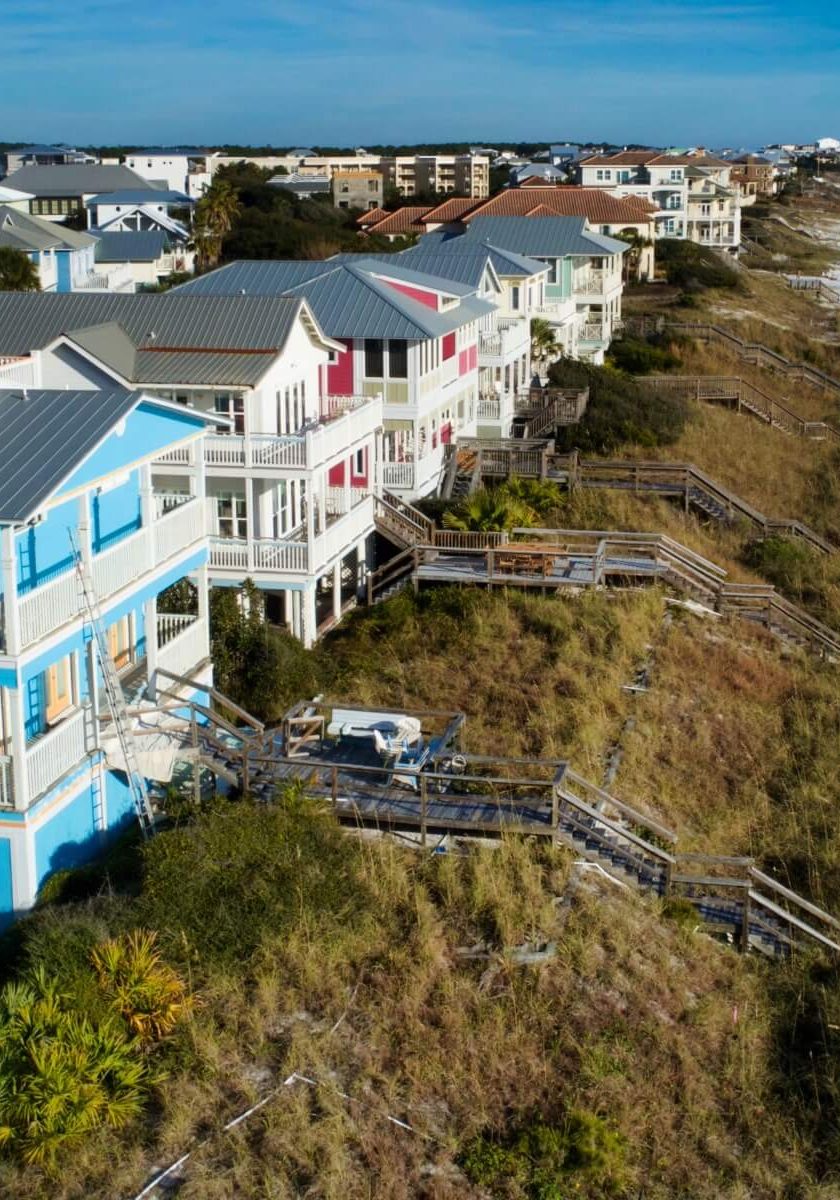 Coastal homes along the shoreline in Santa Rosa Beach, FL, showcasing colorful beach houses and Gulf-front architecture